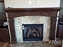 stained mantle curved fireplace